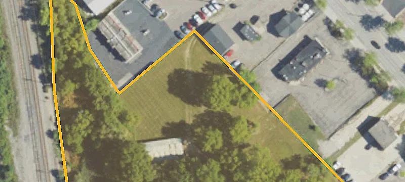 Commercial Land with Existing Buildings