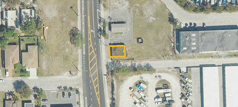 Commercial Land with Retail Building