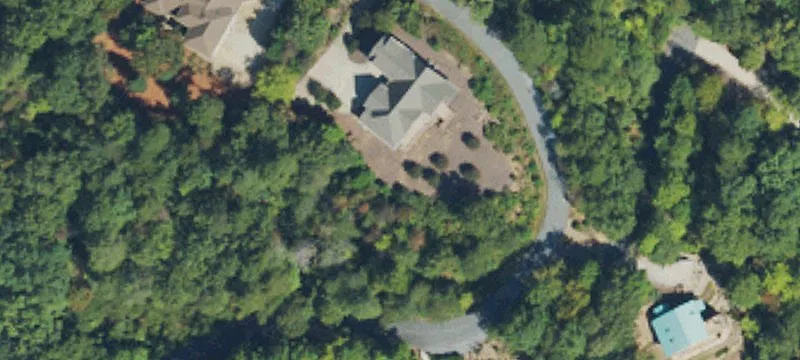 Lakefront Land with Waterfall