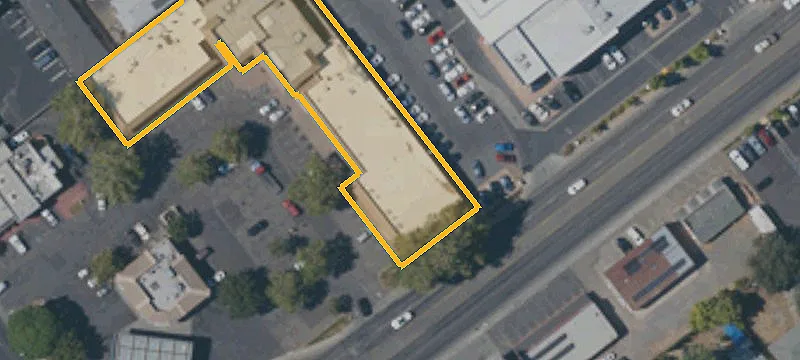 Corner Shopping Center with Drive-Through