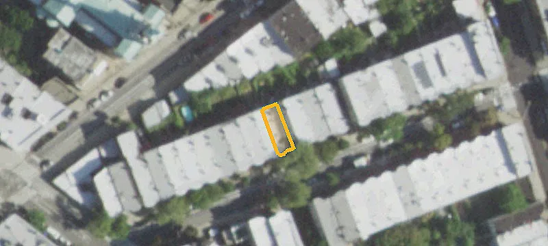 Brick Multifamily Property With Backhouse