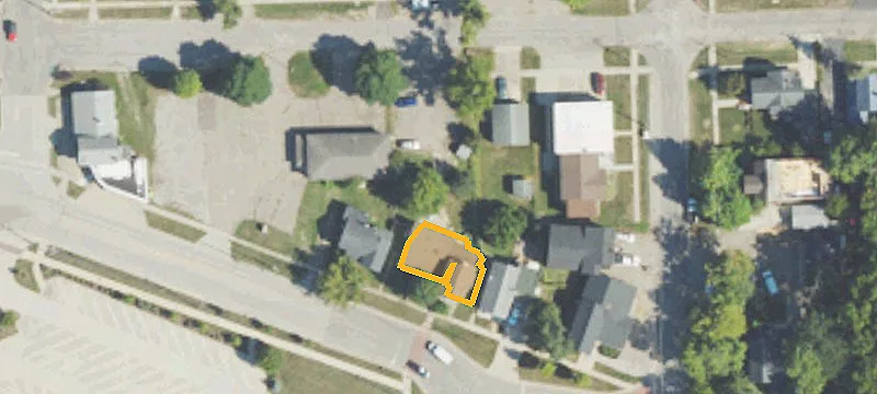 Adjoining Improved Commercial Land