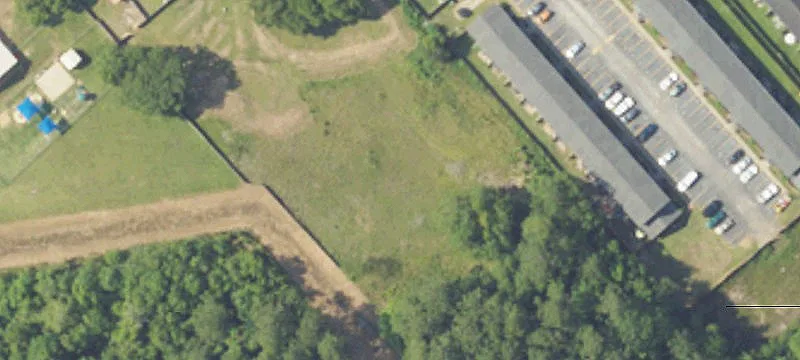 Commercial Land with Existing Buildings