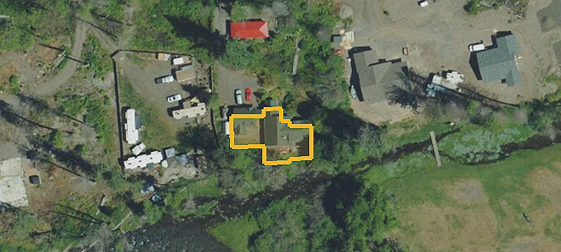 Waterfront Land With Outbuildings