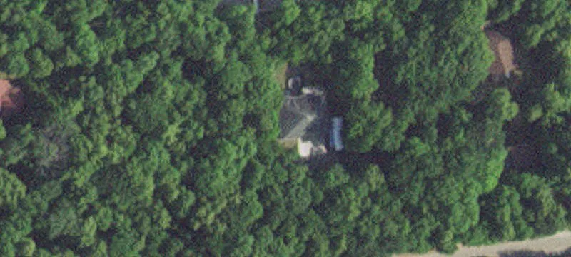 Wooded Waterfront Land With Steel Shed