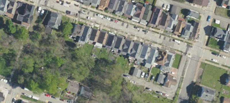 Brick Triplex With Detached Garage