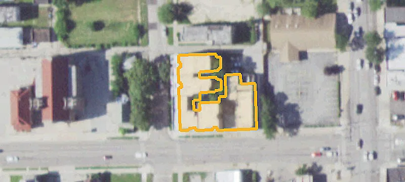 Vacant Apartment Building With Commercial Space