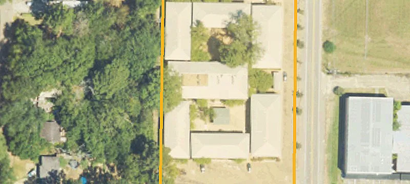 Commercial Land with Fire-Damaged Structure