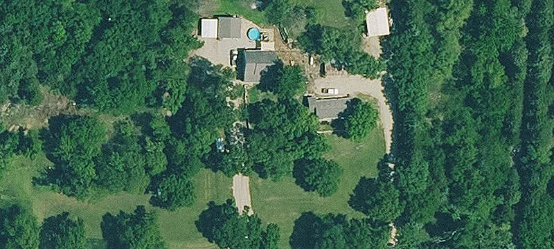 Wooded Land with Outbuildings