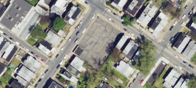 Three-Car Garage With Fenced Lot