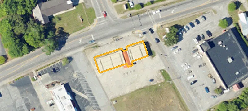 Freestanding Convenience Store with Gas Pumps