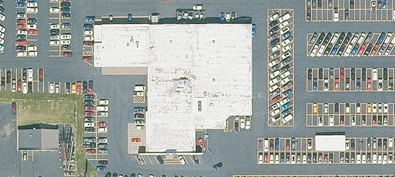 Strip Center with Vacant Parcel