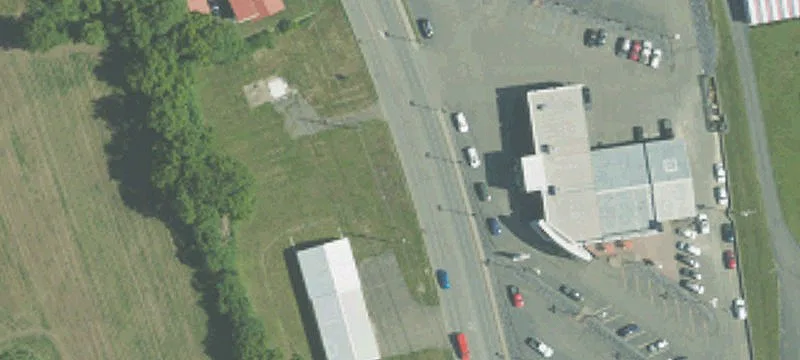 Storefront Property with Vacant Lot