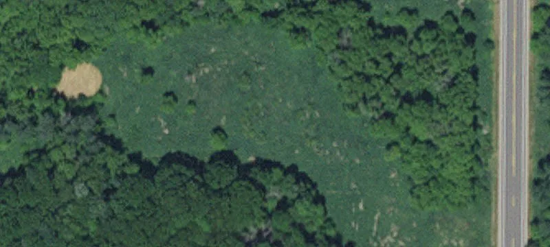 Commercial Land With Existing Improvements