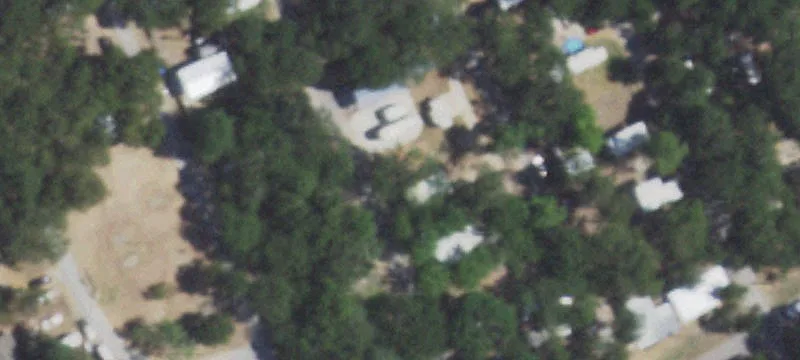 Fenced RV Park With Full RV Cover