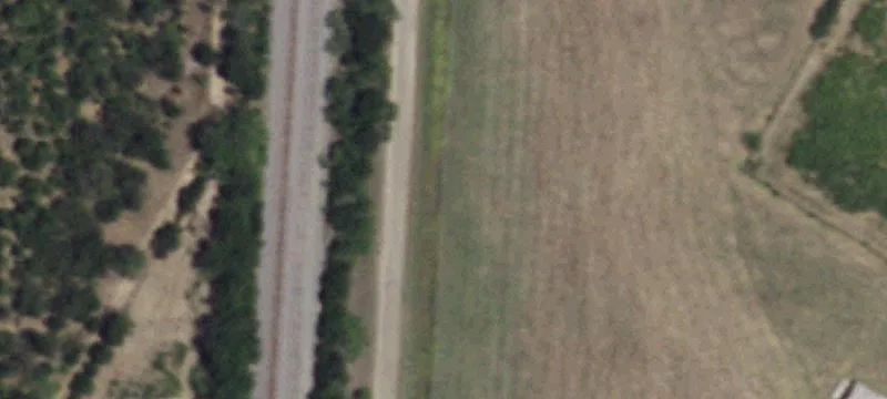 Fenced Farm with Farmhouse