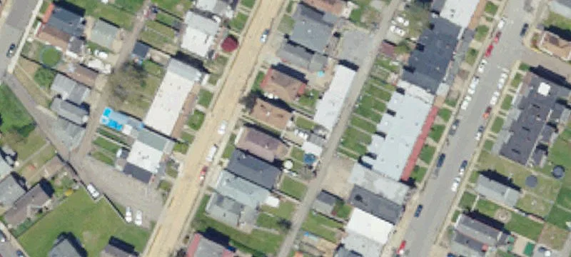 Brick Triplex With Off-Street Parking