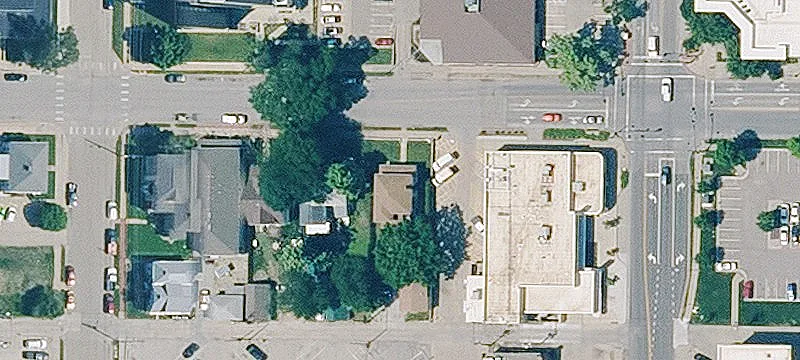 Triplex with Detached Stone Garage