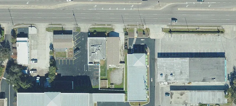 Commercial Land with Existing Buildings