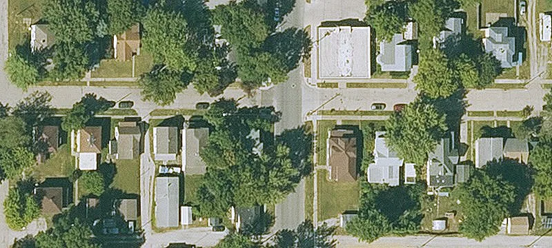 Two-Story Triplex with Carport