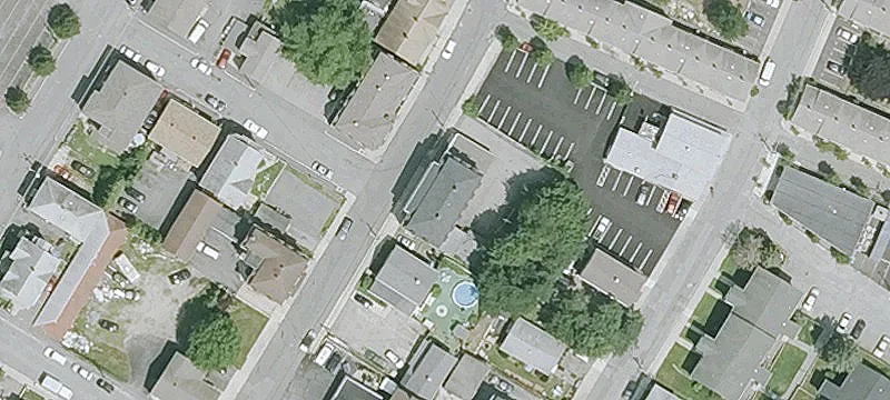 Apartment Building with Detached Garages
