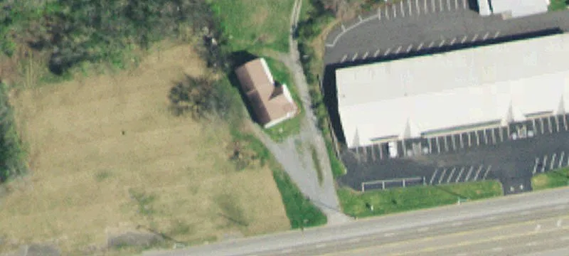 Renovated Office Building with Nine Rooms
