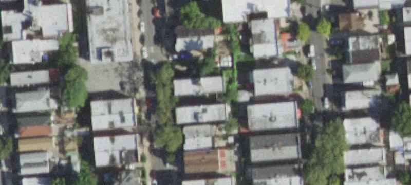 Brick Multifamily Building with Driveway