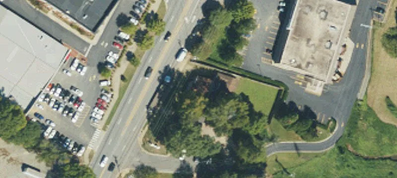 Commercial Land With Brick Home