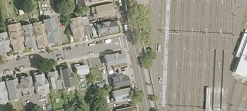 Occupied Triplex With Parking
