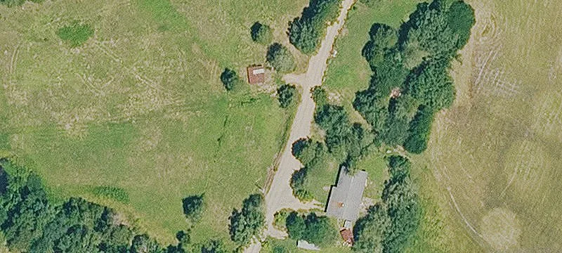 Farm with Creek and Farmhouse