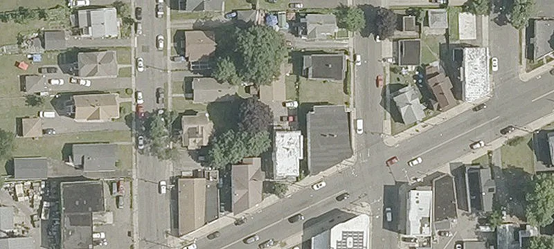 Legal Triplex with Four-Car Garage