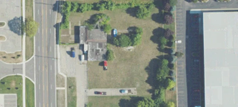 Fenced Commercial Land with Building