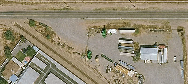 Fenced Commercial Land with Improvements