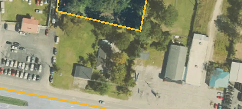 Level Commercial Land with Existing Home