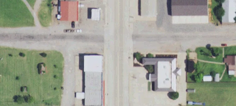 Corner Auto Shop with Overhead Door