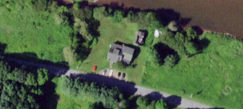Riverfront Triplex with Acreage