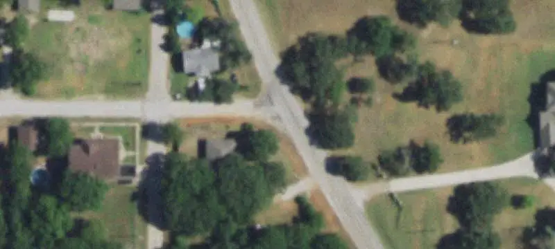 Metal Warehouse with Gravel Parking