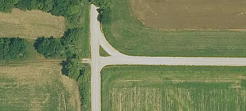 Fenced Agricultural Farmland with Pond