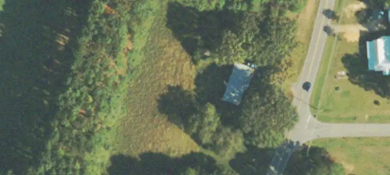 Farm with Barn and Pastures
