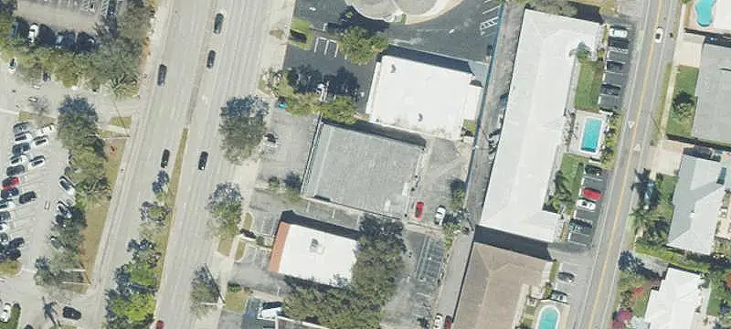 Paved Fenced Parking Lot
