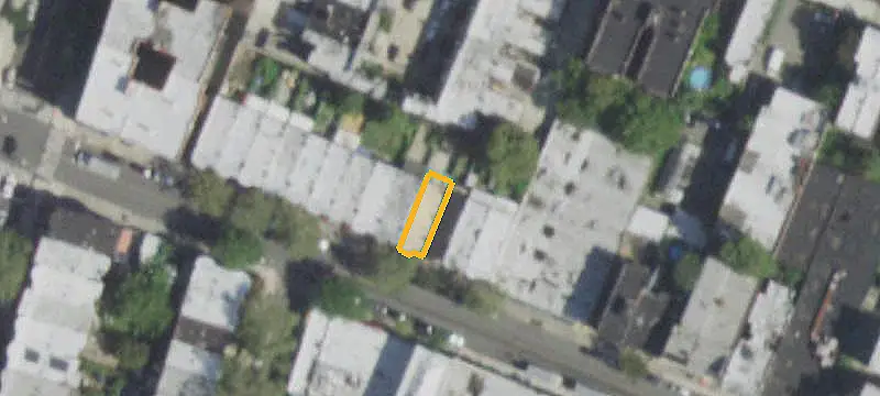 Attached Brick Three-Family Property
