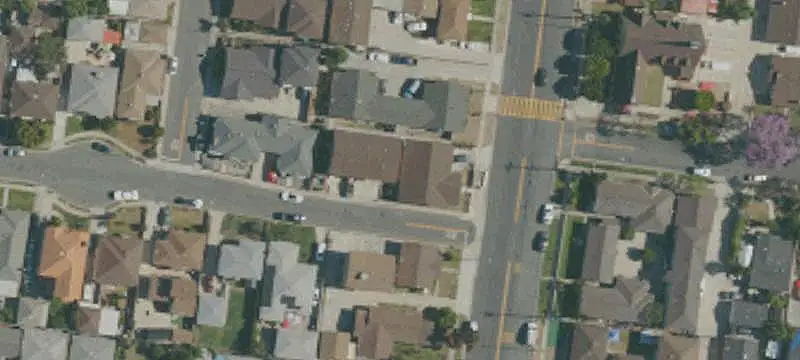 Updated Triplex with Four-Car Garages