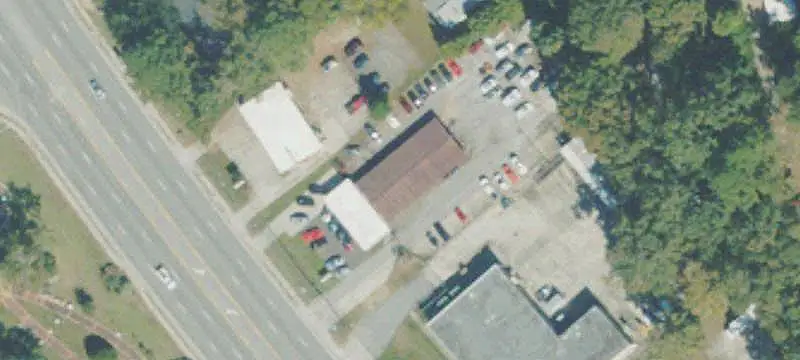 Fenced Auto Shop with Covered Canopy