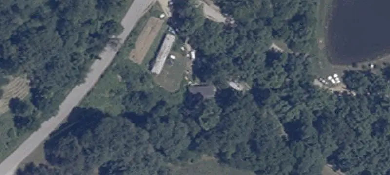 Wooded Farm with Pole Barn