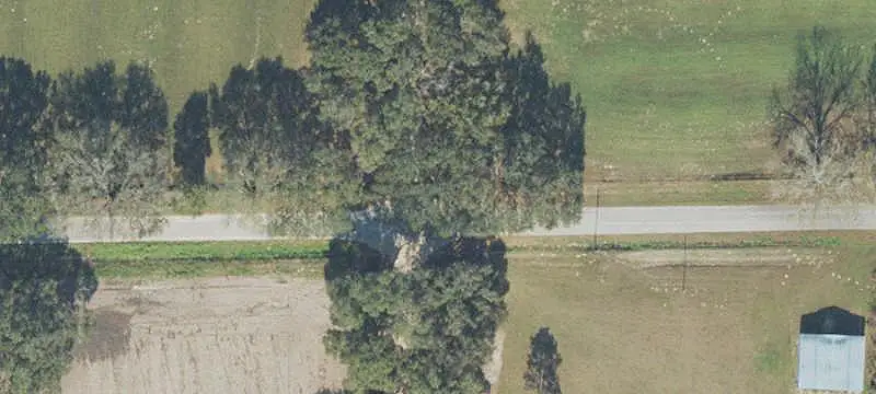 Fenced Agricultural Land with Pole Barns
