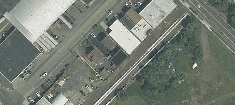 Fenced Industrial Warehouse with Loading