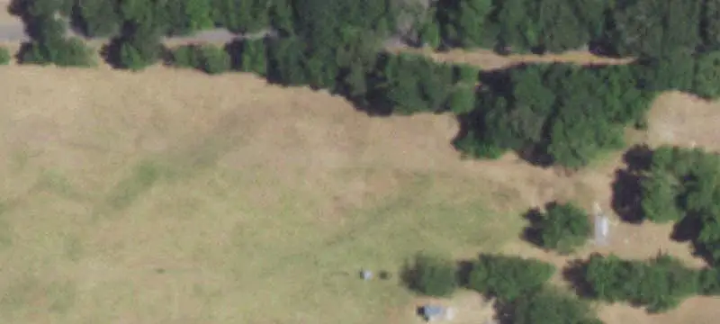Fenced Agricultural Land with Pond