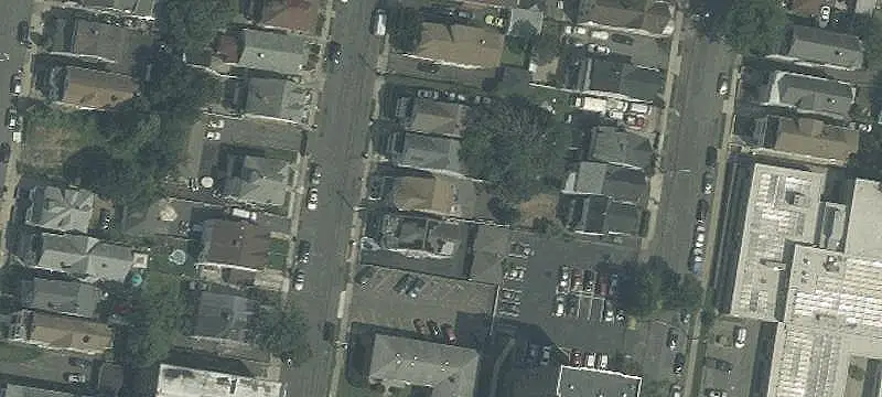 Updated Triplex With Basement Potential
