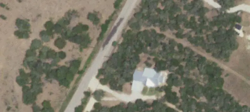 Wooded Acreage Ranch with Workshop