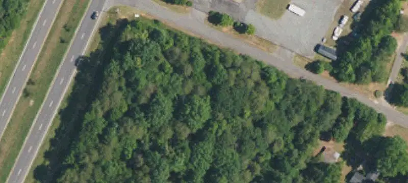 Level Wooded Commercial Land